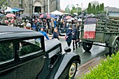 France, Territoire de Belfort, Vézelois, street, church, historical reconstruction of the Liberation of the village in 1944, during the celebrations of May 8, 2019, Citroën Traction Avant vehicle, children of schools celebrating the end of the war