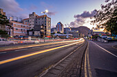 View of trail lights and city skyline in Port Louis at dusk, Port Louis, Mauritius, Indian Ocean, Africa