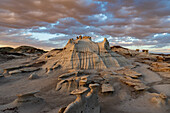Usa, New Mexico, Bisti Wilderness, Clouds over badlands rock formations in Bisti/De-Na-Zin Wilderness