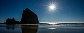 USA, Oregon, Silhouette of Haystack Rock at Cannon Beach