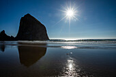 USA, Oregon, Silhouette of Haystack Rock at Cannon Beach