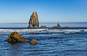 USA, Oregon, Rock formations in ocean at Cannon Beach