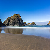 USA, Oregon, Rock formations in sea at Cannon Beach 