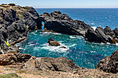 USA, Oregon, Brookings, View of rocky natural arch over sea 