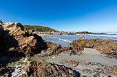 South Africa, Hermanus, Rocky coastline and sea at Voelklip Beach