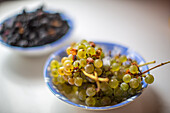 Blackberries and Grapes in Ceramic Bowls