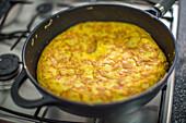 Traditional Spanish Potato Omelette in a Skillet