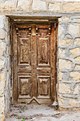 Faiyum, Egypt. Wooden door in a wall.