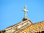 Kreuz auf der Spitze der alten Kathedrale von Santiago.