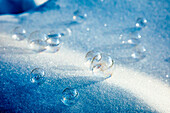 USA, Alaska, Chena Hot Springs Resort. Close-up of bubbles on snow.