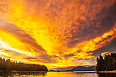 USA, Alaska, Tongass National Forest. Sunset on Admiralty Island and inlet.