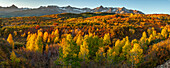 USA, Colorado. Panoramic of San Juan Mountains and valley forest in autumn.