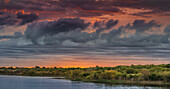 USA, New Jersey, Cape May National Seashore. Panoramic with lake and clouds lit at sunrise.