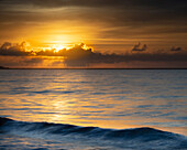 USA, New Jersey, Cape May National Seashore. Sunrise on ocean shore.