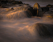 USA, New Jersey, Cape May National Seashore. Sunrise on ocean shore.