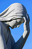 USA, Vermont, Barre. Stone statue of woman in Hope Cemetery.