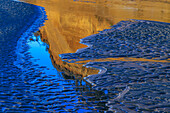 USA, Washington State, Copalis Beach, Iron Springs. Patterns in beach sand at sunset.