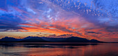 USA, Washington State, Seabeck. Sunset panoramic of Hood Canal and Olympic Mountains.