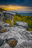 USA, West Virginia, Dolly Sods Wilderness Area. Sunrise on mountain boulders and forest.