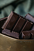 Close-up view of pieces of dark chocolate bars