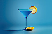 Side view of a blue cocktail glass on a table in a luxury blue interior. Generative AI