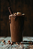 Front view of vegan chocolate smoothie with nuts