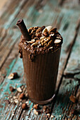 Tasty vegan chocolate milkshake with natural nuts