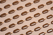 From above background of chocolate ice creams forming parallel lines