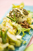 Celery salad with walnuts, pear and goat's cheese