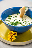 Cheese fondue with chives and white bread