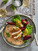 Chicken fillet with basil sauce and vegetables
