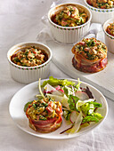 Savoury egg muffins with bacon and salad