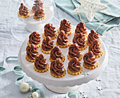 Nougat cream towers on sponge biscuits