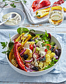 Pasta salad with roasted peppers and yoghurt dressing