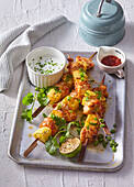 Chicken and pineapple skewers with garlic dip