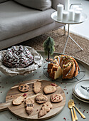 Christmas decorated coffee table with cake and biscuits