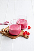 Beetroot skyr with raspberries and cashew nuts