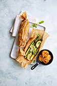 Lemon asparagus with herbs in parchment