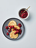 Tofu and vanilla pancakes with berry compote