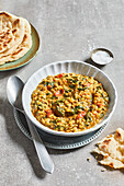 Lentil dal with spinach and tomatoes