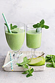Green apple smoothie with mint and spinach