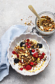 Yoghurt with nut granola and fresh berries