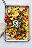 Oven-roasted vegetables with yoghurt dip and chickpeas