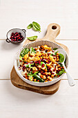 Cauliflower and chickpea salad with pomegranate seeds