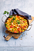 Millet paella with beans and peppers