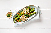 Asparagus with tomato vinaigrette and oat biscuits