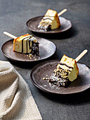 Cheesecake on a stick with chocolate icing