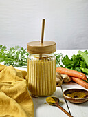 Carrot smoothie with ginger and turmeric