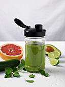 Green smoothie with avocado and lime