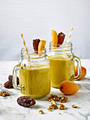 Apricot and date smoothie with walnuts